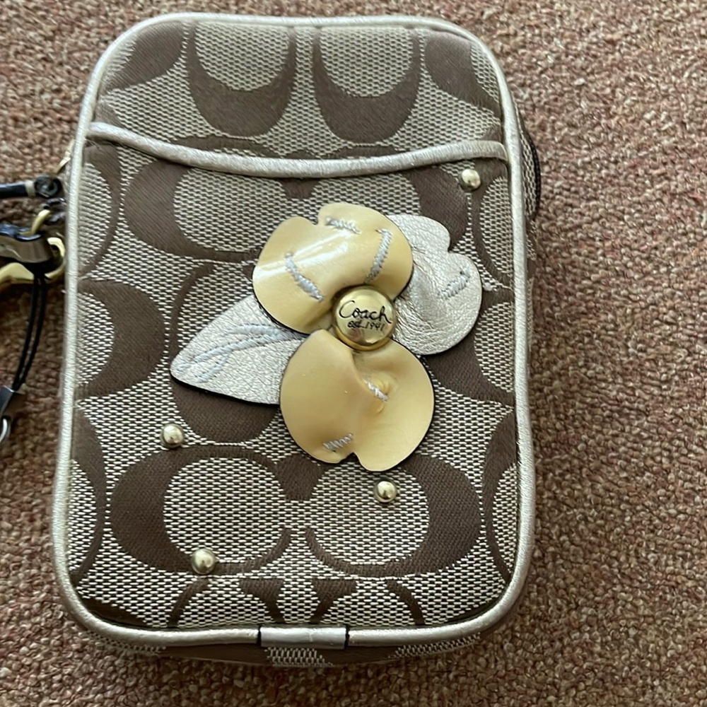 Coach wristlet accessory case.
